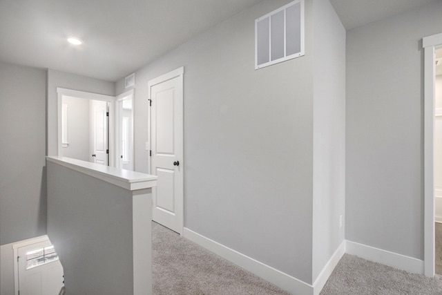 304 Ash St, South Haven, MI 49090 - corridor featuring visible vents, baseboards, and light carpet