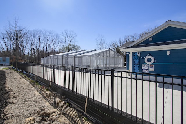 304 Ash St, South Haven, MI 49090 - view of pool featuring fence, an exterior structure, and an outbuilding