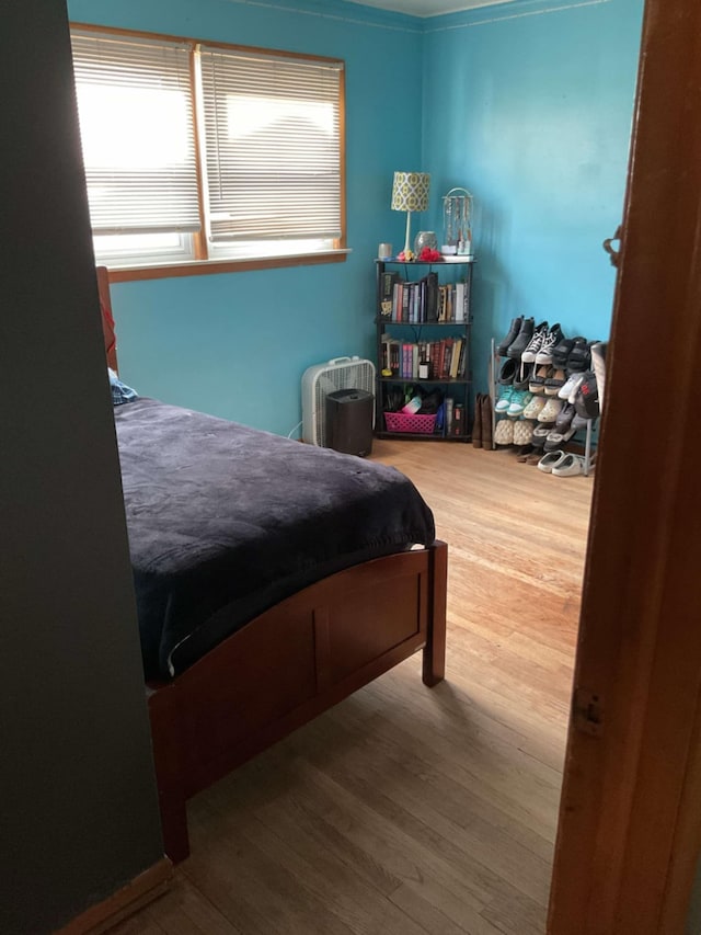 bedroom featuring hardwood / wood-style flooring