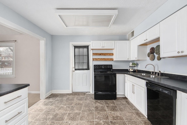 kitchen with white cabinetry, sink, a textured ceiling, and black appliances