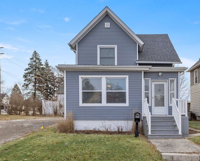 view of front of home with a front yard