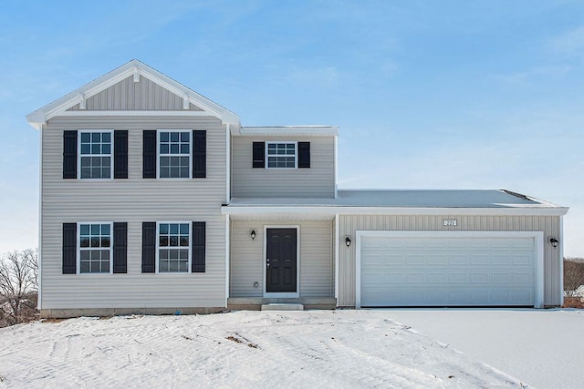 view of front of house with a garage