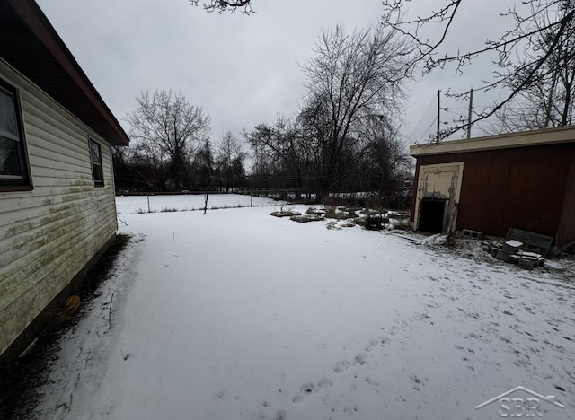 view of snowy yard