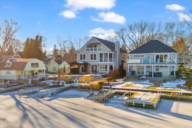 view of snow covered house