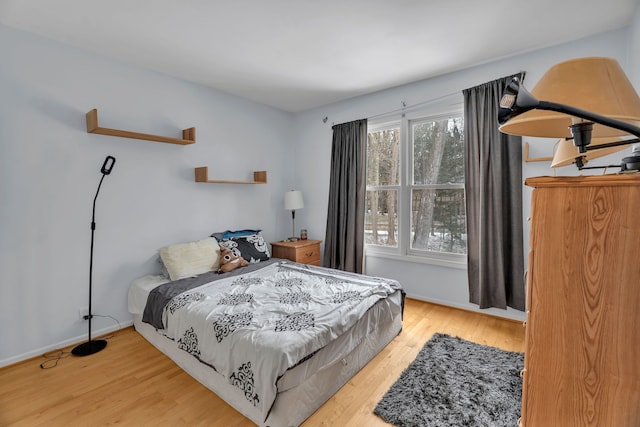 bedroom featuring light wood-type flooring