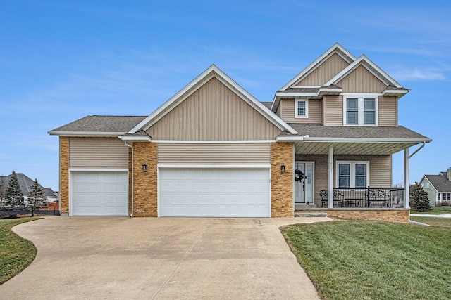 craftsman inspired home featuring a garage, a front yard, and covered porch