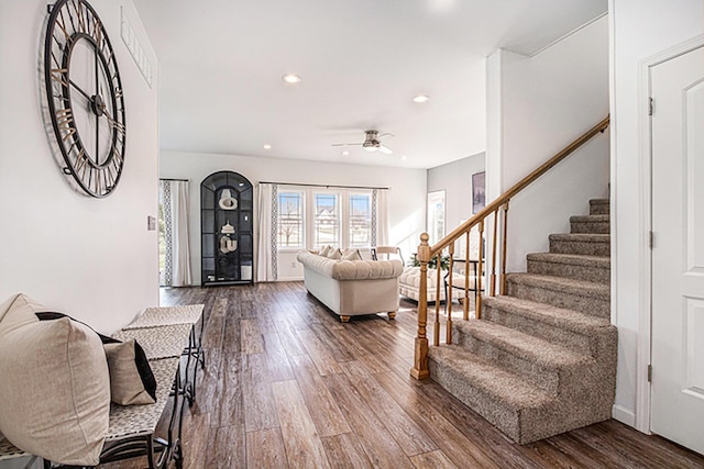 interior space with ceiling fan and hardwood / wood-style floors