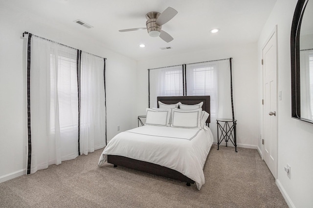 carpeted bedroom featuring ceiling fan