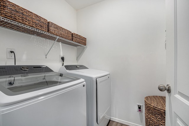 laundry room with washer and clothes dryer