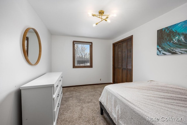 carpeted bedroom with a closet