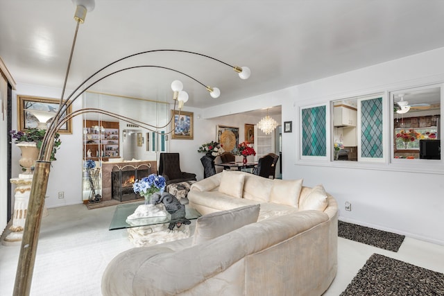 living room with an inviting chandelier