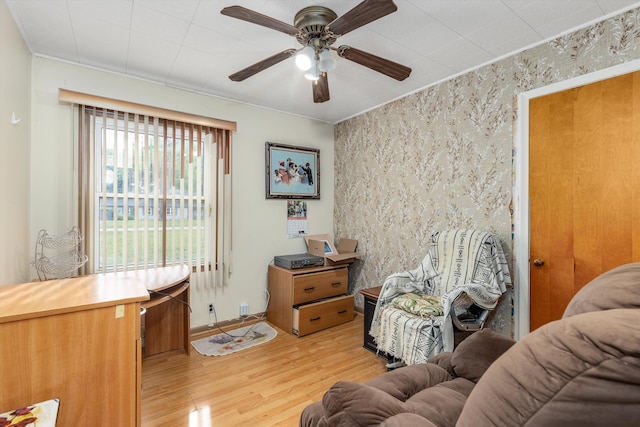 interior space with ceiling fan and light wood-type flooring