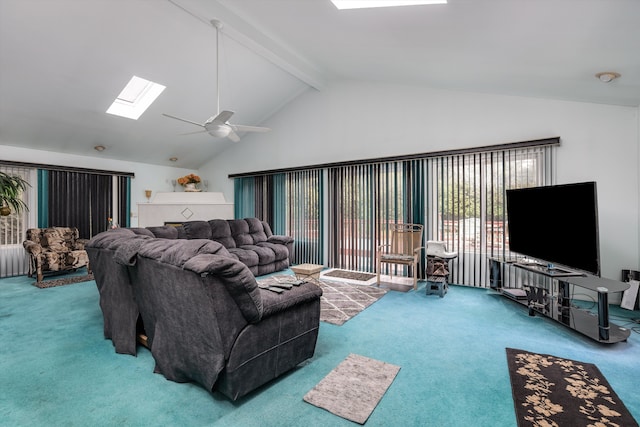 living room featuring a skylight, high vaulted ceiling, carpet floors, ceiling fan, and beam ceiling