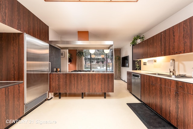 kitchen featuring stainless steel appliances and sink