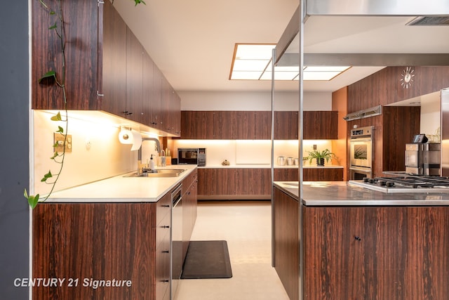 kitchen with sink and stainless steel appliances