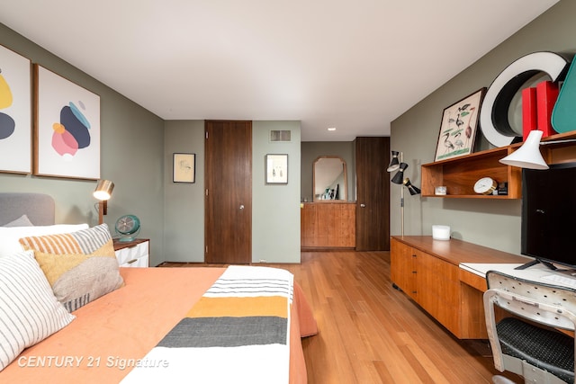 bedroom featuring light hardwood / wood-style floors