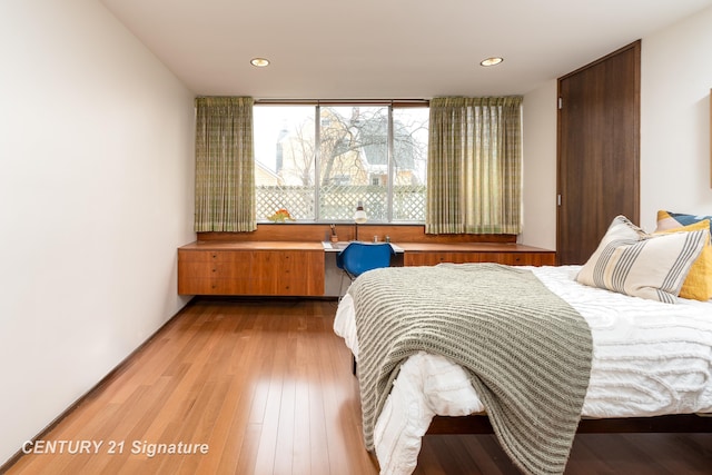 bedroom featuring light wood-type flooring