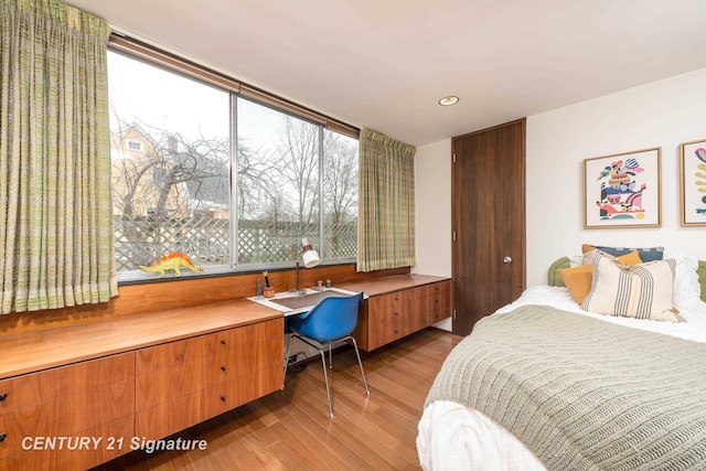 bedroom featuring hardwood / wood-style flooring