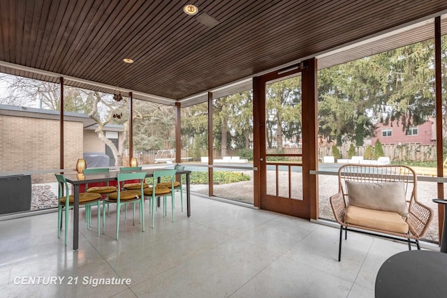 sunroom / solarium with a wealth of natural light