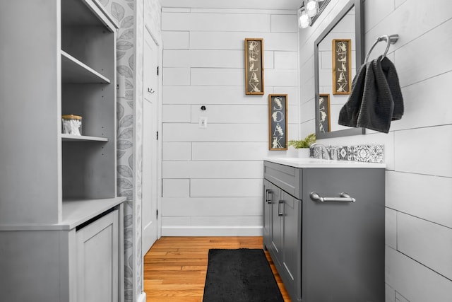 bathroom featuring vanity and hardwood / wood-style flooring