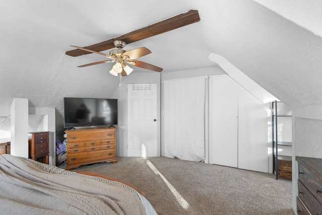 carpeted bedroom featuring lofted ceiling and ceiling fan