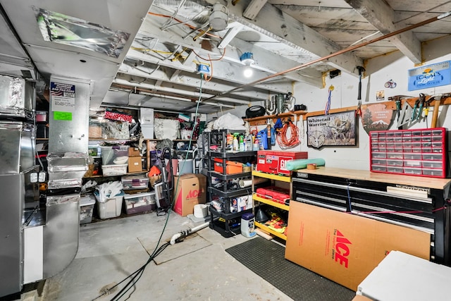 basement with a workshop area