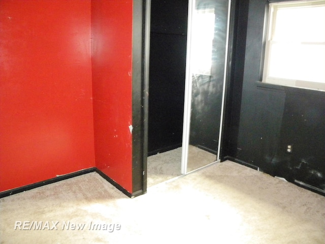 unfurnished bedroom featuring a closet