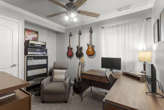 carpeted office space featuring ceiling fan and ornamental molding