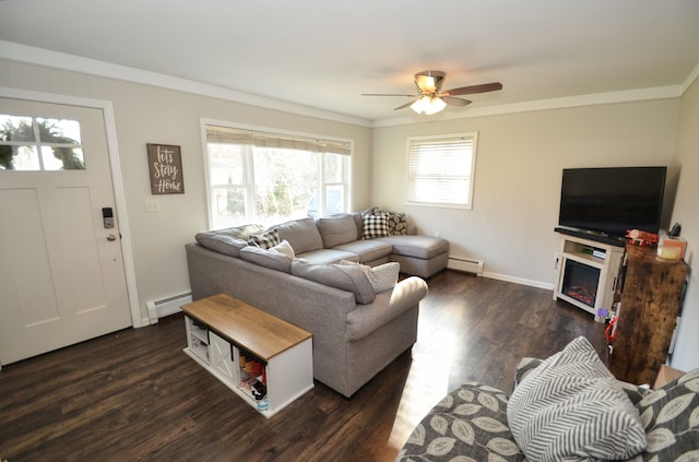 living room with ornamental molding, dark wood-type flooring, and baseboard heating