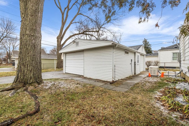 garage with a lawn