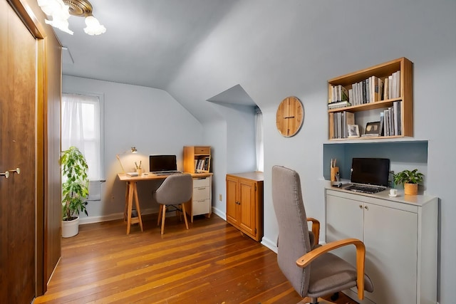 office area featuring lofted ceiling and hardwood / wood-style floors