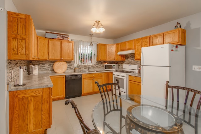 kitchen with sink, hanging light fixtures, a notable chandelier, white appliances, and backsplash