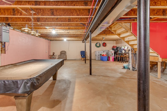 rec room with concrete flooring