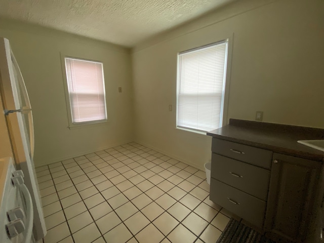 interior space with a textured ceiling