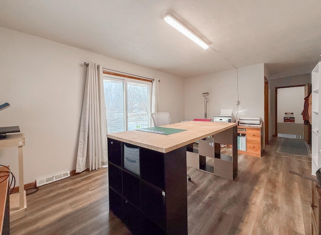 office area with wood-type flooring