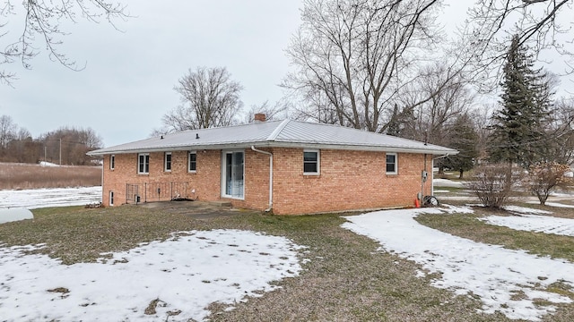 view of snow covered property