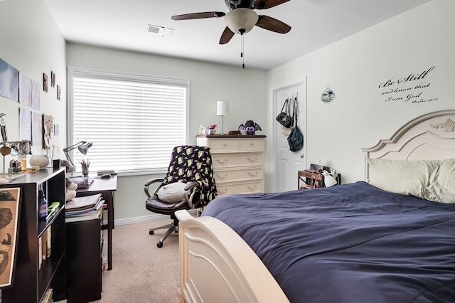 bedroom featuring ceiling fan and light colored carpet