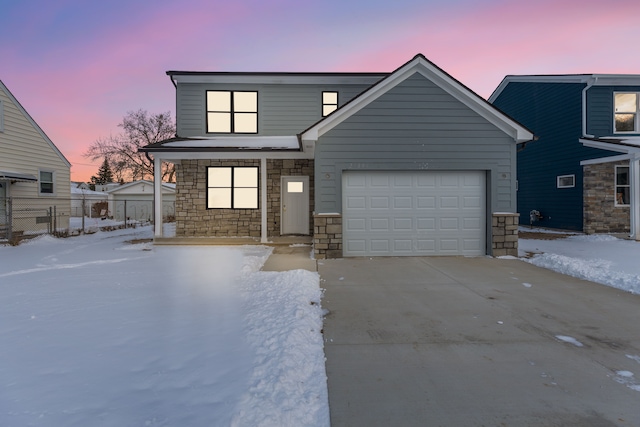 view of front of home featuring a garage