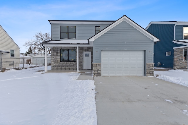 view of front of property featuring a garage