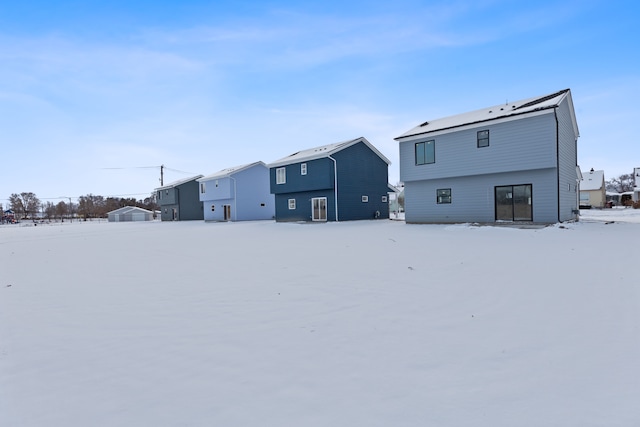 view of snow covered property