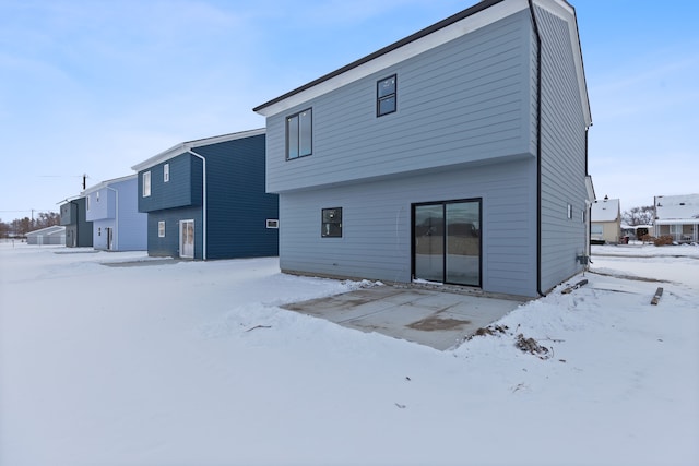 view of snow covered property