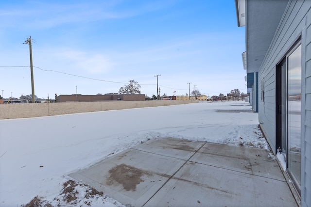 view of yard covered in snow