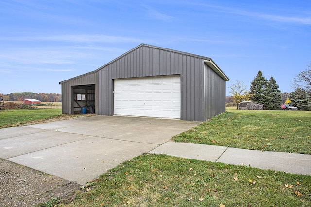 garage featuring a yard