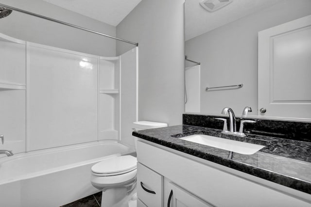 full bath featuring visible vents, bathing tub / shower combination, toilet, tile patterned flooring, and vanity