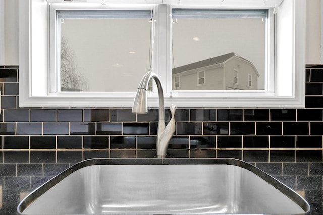 interior details featuring a sink