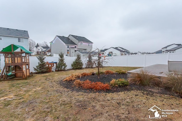 view of yard with a playground