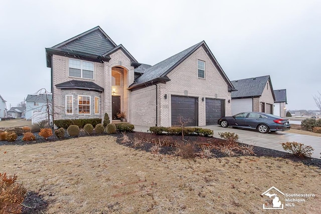 view of front of property with a garage