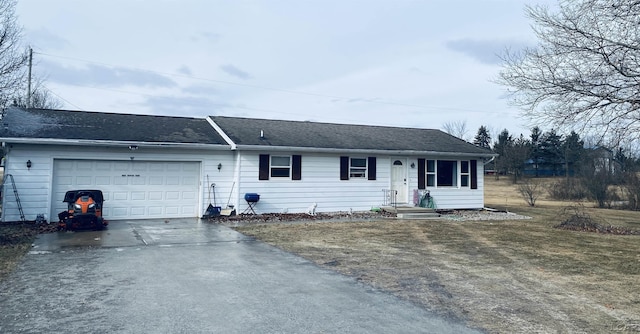 single story home featuring a garage