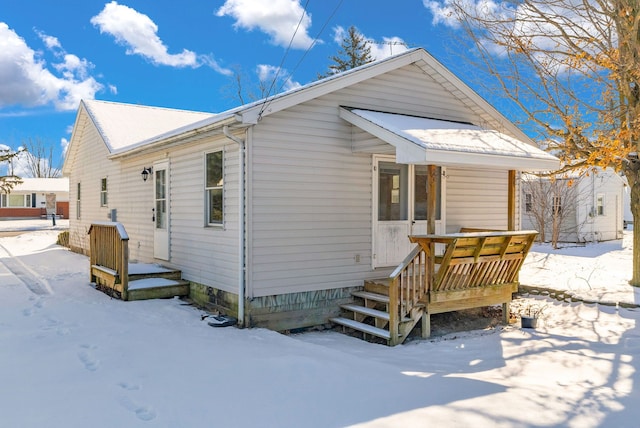 view of snow covered property