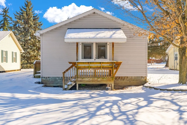 view of snow covered property